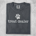 Dark grey t-shirt with a white paw print and "treat dealer" text.