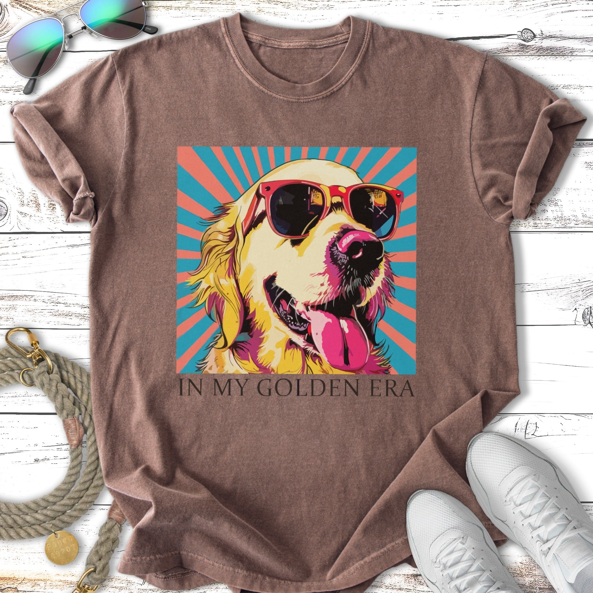 Golden retriever wearing sunglasses, tongue out, on stylized colorful background.