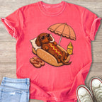 Dachshund wearing heart sunglasses relaxing in a hot dog bun with sunscreen.