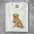 Golden retriever with "I love MOM" tattoo on chest, on a white t-shirt.