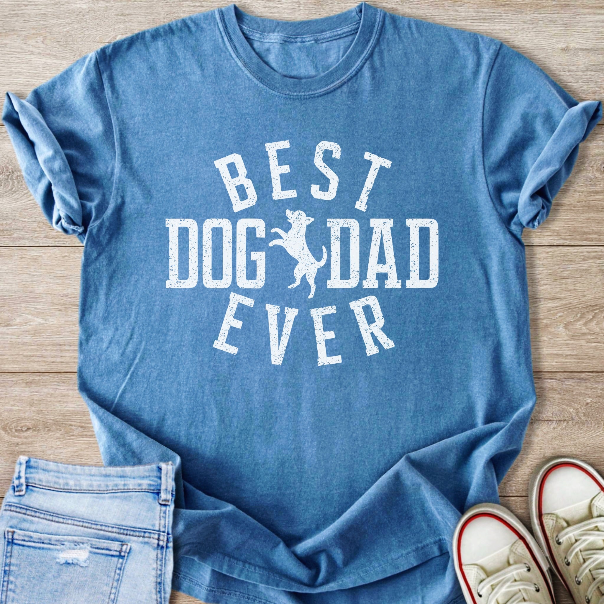 Blue t-shirt with white text "BEST DOG DAD EVER" and a dog silhouette.