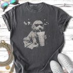 Dark t-shirt with a dog wearing sunglasses drinking from a large cup.