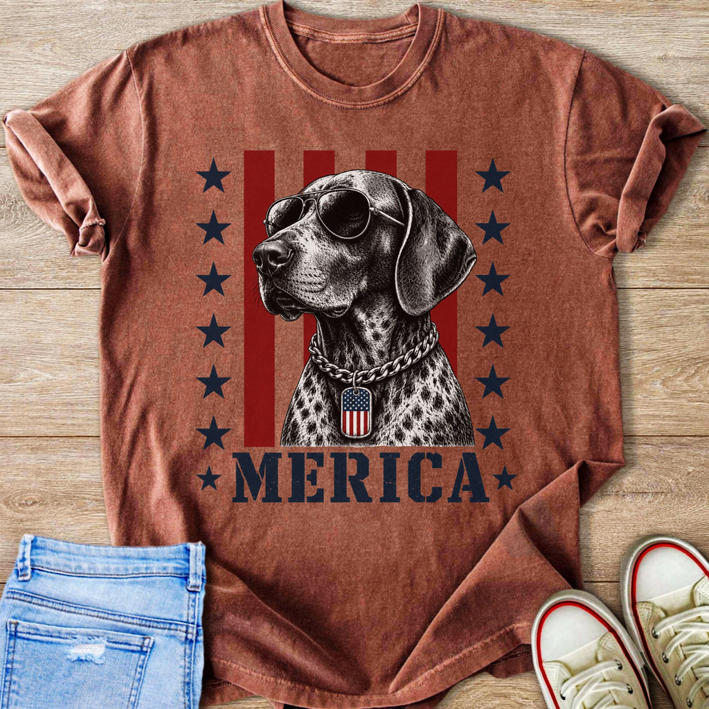 Dog with sunglasses and American flag tag, wearing a chain, with "MERICA" text.