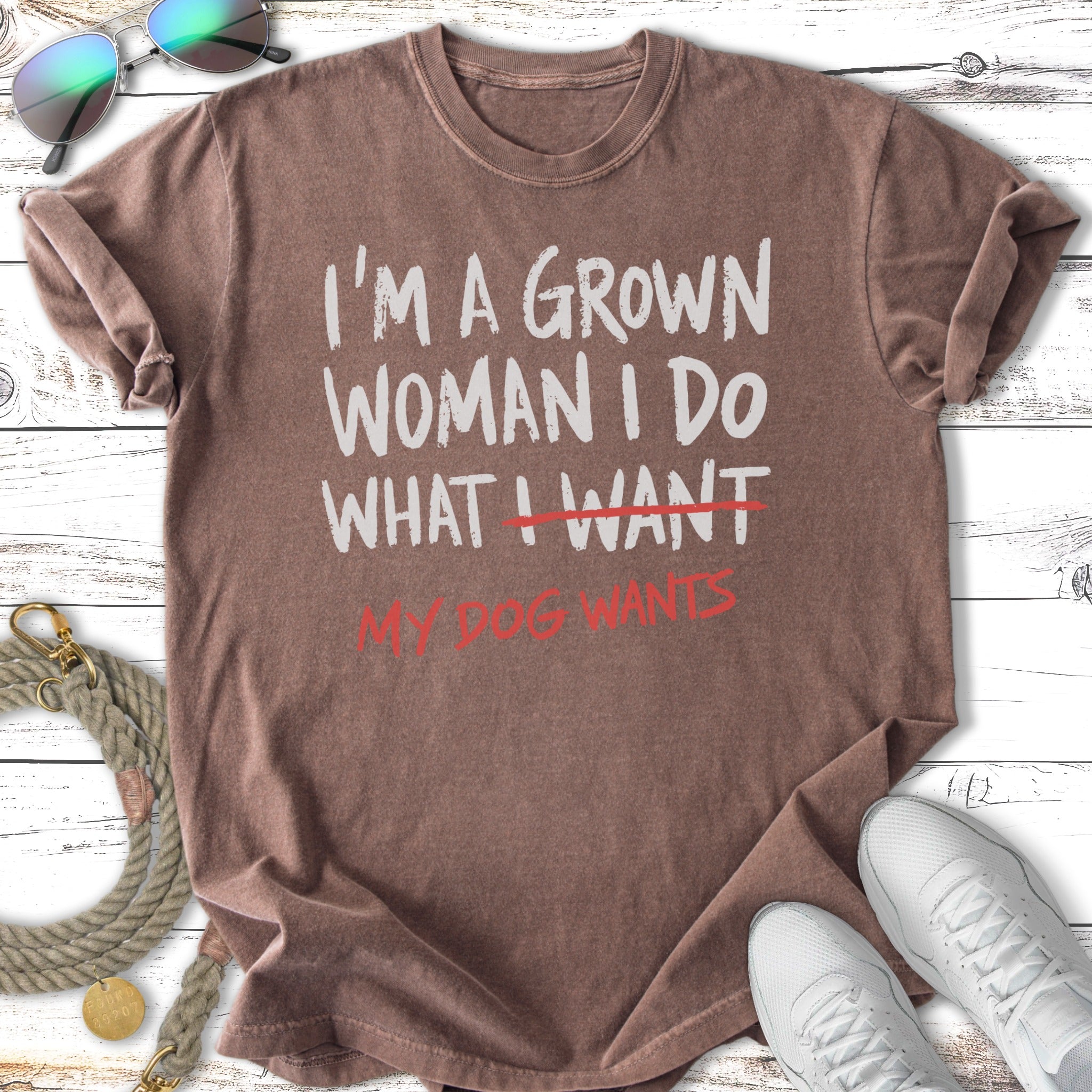 Brown t-shirt with "I'm a grown woman I do what I want" and "my dog wants" in red.