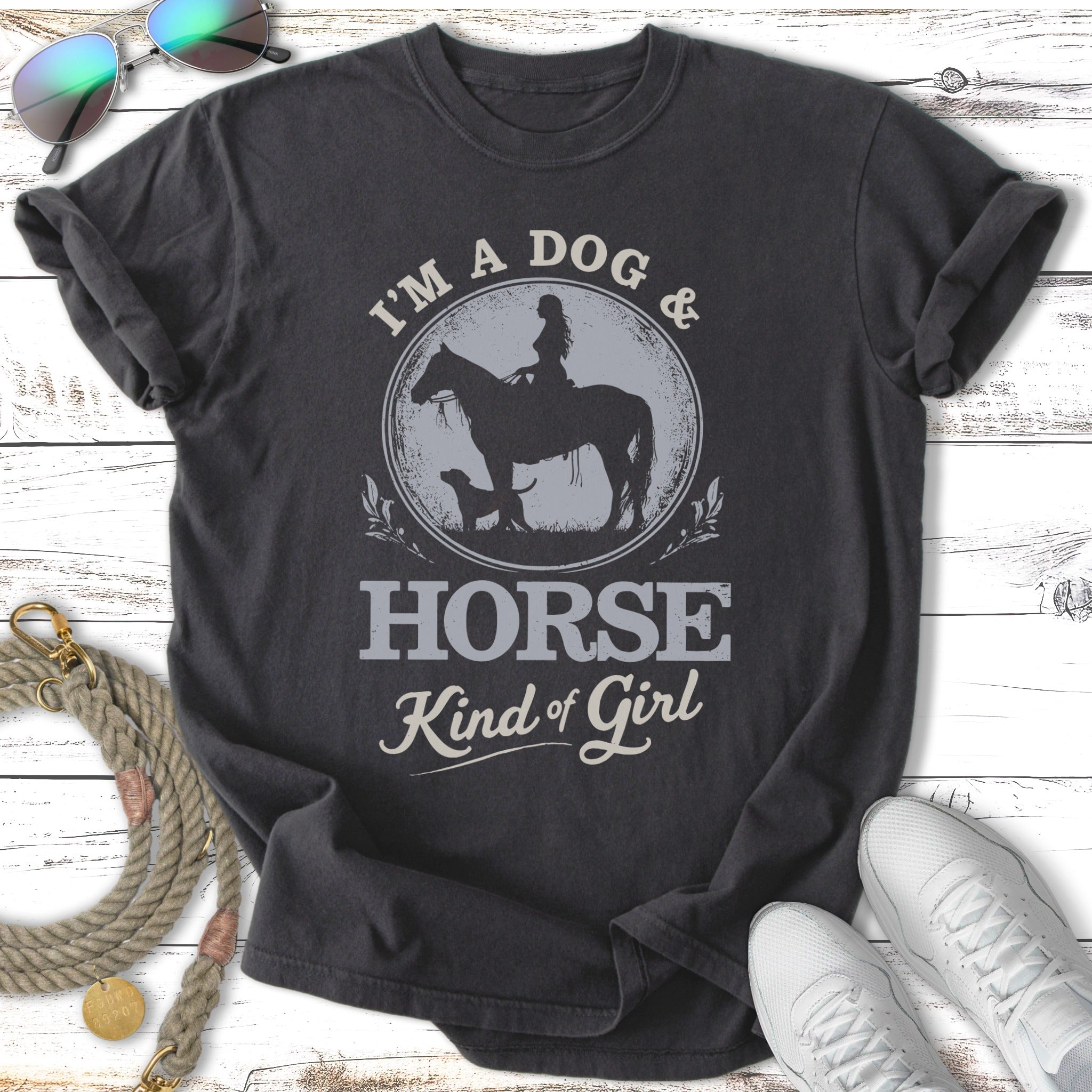 Dark t-shirt with "I'm a Dog & Horse Kind of Girl" text and equestrian graphic.