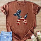 Red t-shirt with a dog shaped balloon graphic in American flag colors.