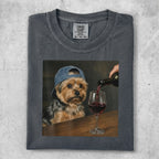 T-shirt with a painting of a dog wearing a baseball cap, pouring red wine.