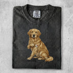 Golden retriever with "I MOM" heart tattoo on its chest.