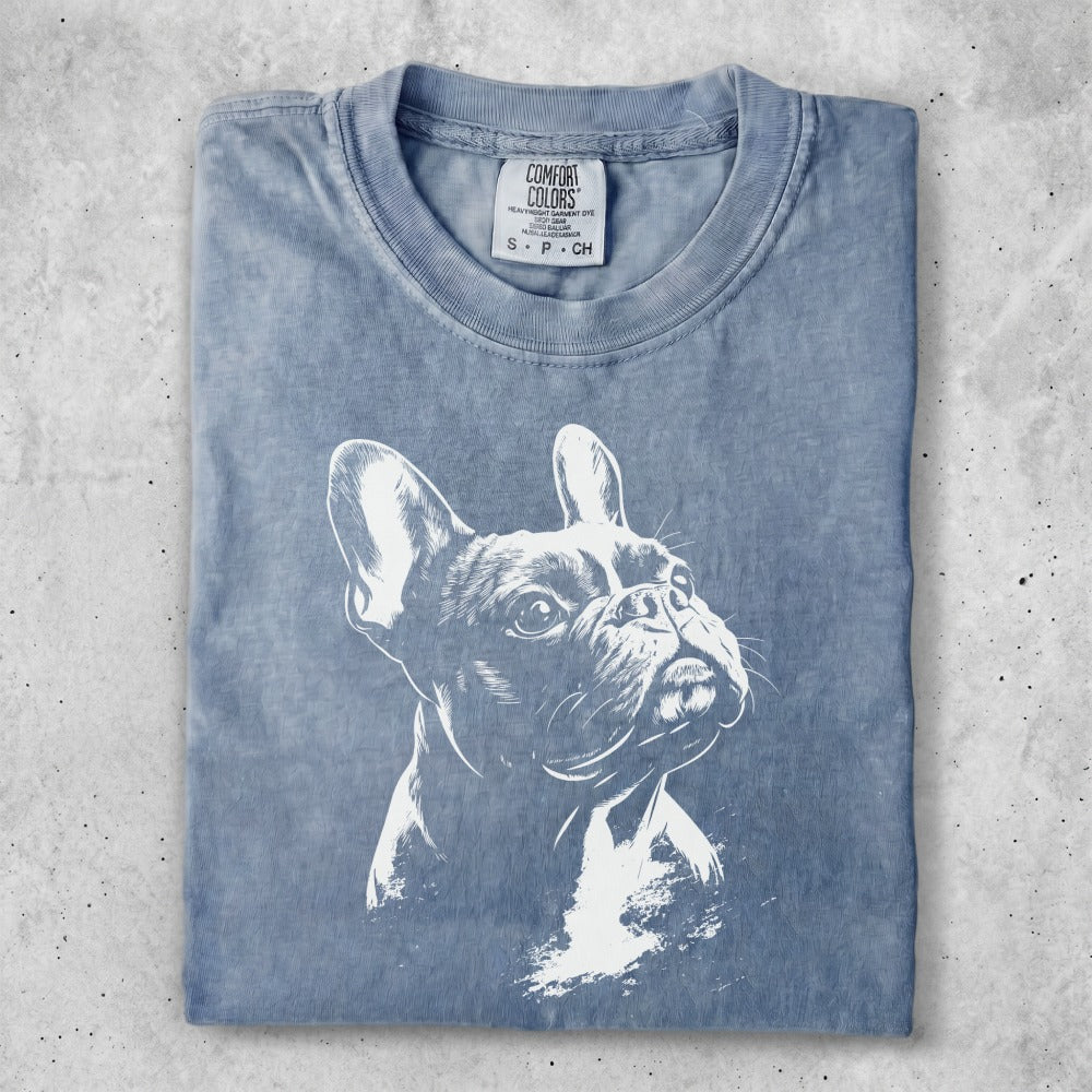Blue t-shirt with a white line drawing of a French Bulldog.