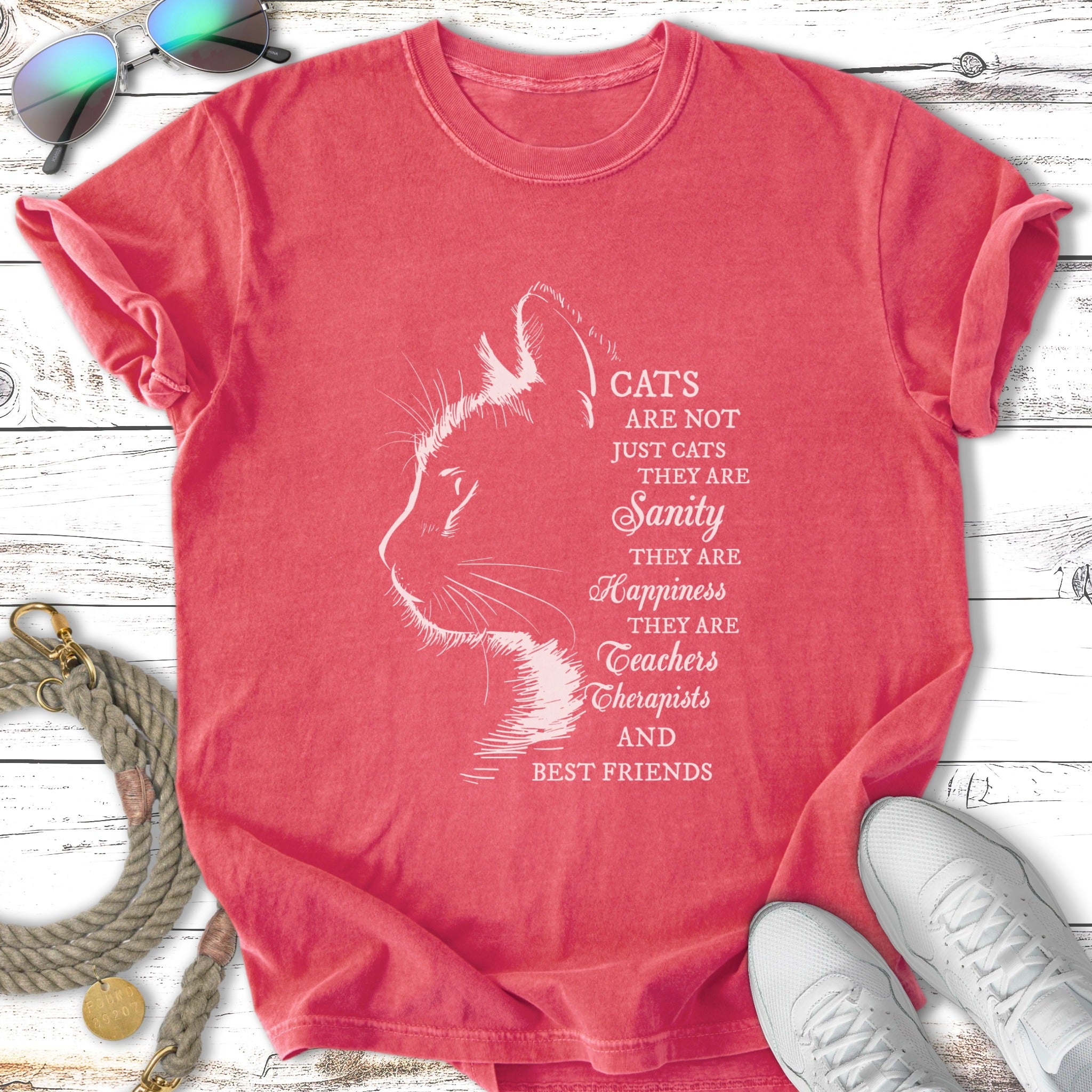 T-shirt with a cat silhouette and text: "Cats are not just cats, they are sanity, happiness, teachers, therapists, and best friends."