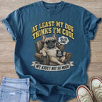 French bulldog in armchair with sunglasses and coffee says "At least my dog thinks I'm cool."