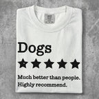 White t-shirt with "Dogs" text and five stars, below text "Much better than people."
