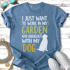 Blue t-shirt with white and yellow text about gardening and dogs.