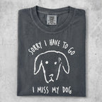 Gray t-shirt with a white line drawing of a dog's face and text "SORRY I HAVE TO GO I MISS MY DOG".