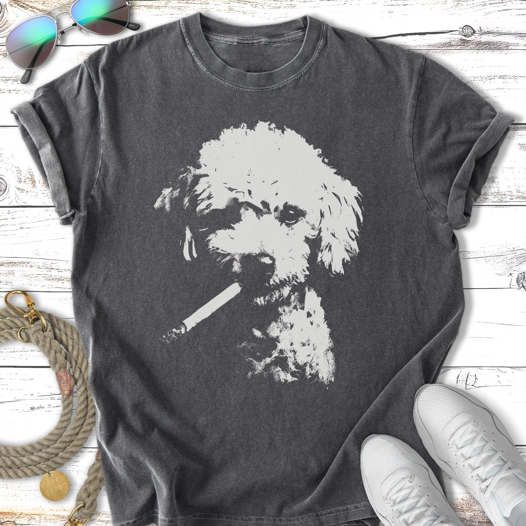 T-shirt with a graphic of a poodle holding a cigarette in its mouth.