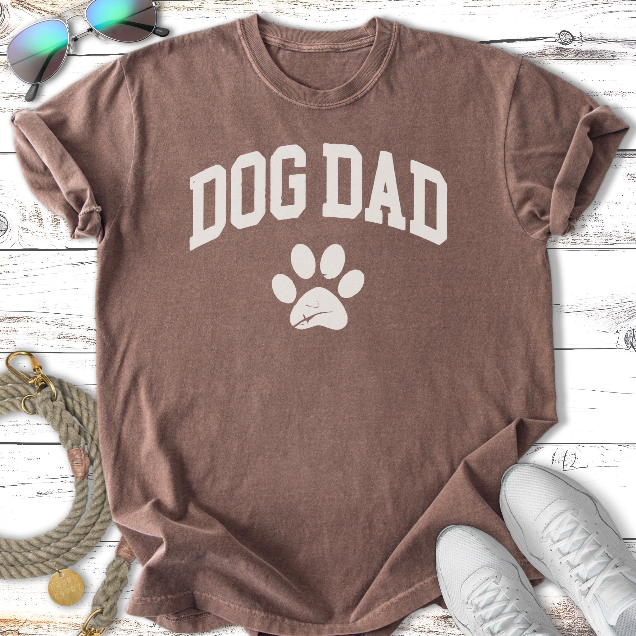 Brown t-shirt with "DOG DAD" and a paw print graphic.