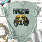 Beagle dog face with "Selective Hearing Department" text on a light green t-shirt.