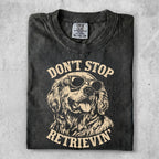 T-shirt with sunglasses-wearing Golden Retriever and text "DON'T STOP RETRIEVIN'".