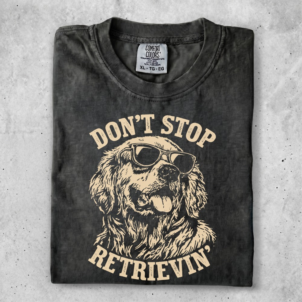 T-shirt with sunglasses-wearing Golden Retriever and text "DON'T STOP RETRIEVIN'".