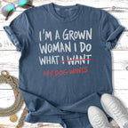 Blue t-shirt with "I'm a grown woman I do what I want, my dog wants" text.