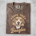Beagle dog graphic with "Save the Beagles" text on a brown t-shirt.