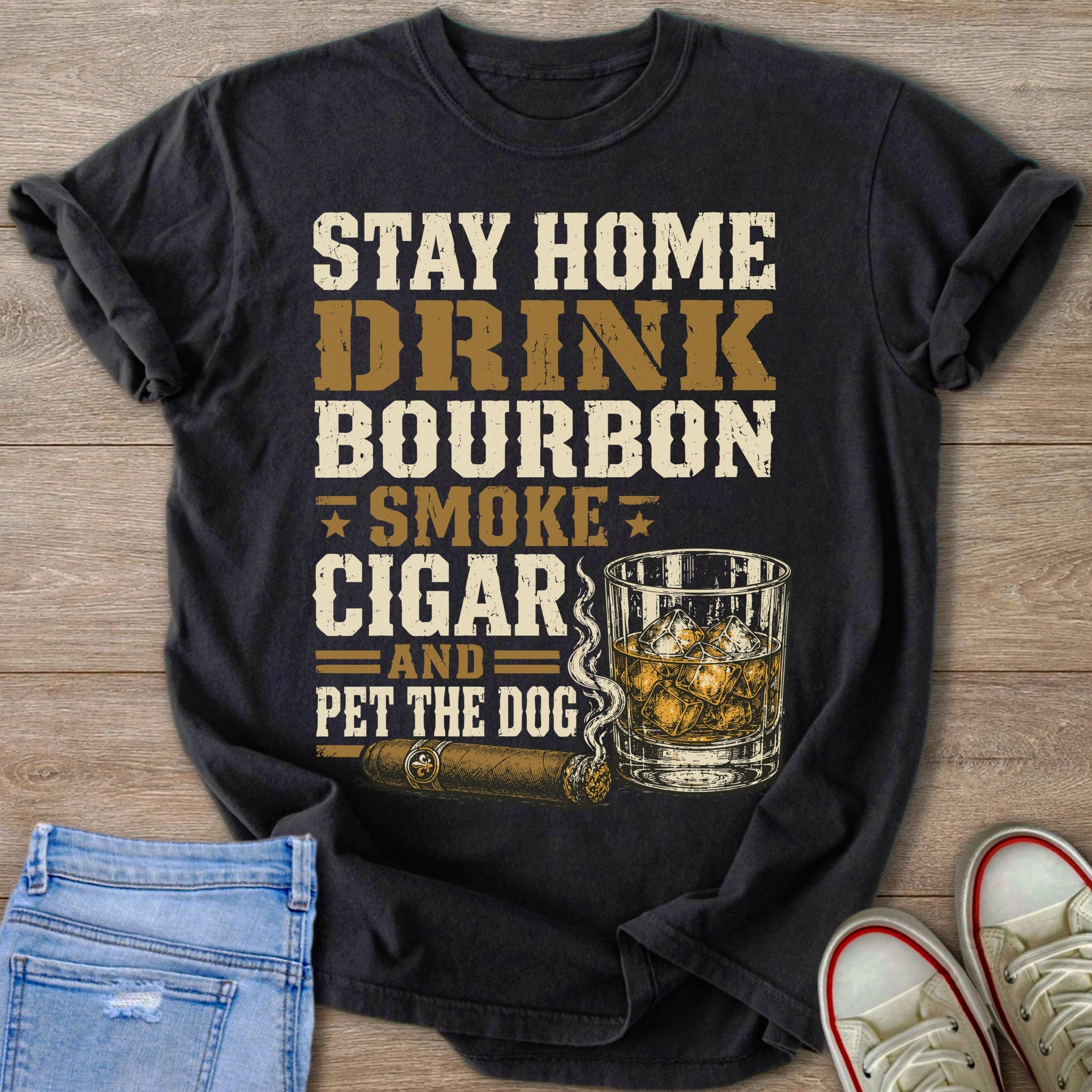 Black t-shirt with graphic text: Stay Home Drink Bourbon Smoke Cigar And Pet the Dog