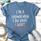 Blue t-shirt with text "I'm a grown man I do what I want my dog wants".