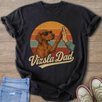 Vizsla dog in sunglasses gives a high five with text "Vizsla Dad."