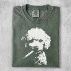T-shirt with a faded print of a poodle smoking a cigarette.