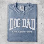 Blue t-shirt with "DOG DAD" and paw print graphic.
