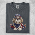 Shih Tzu wearing sunglasses and USA flag bandana and hat.