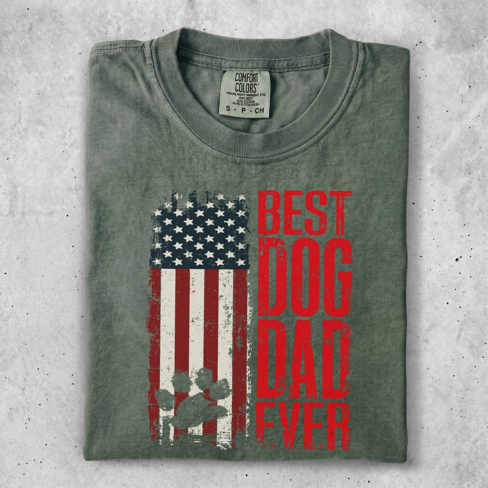 Green t-shirt with distressed US flag and red "Best Dog Dad Ever" text.