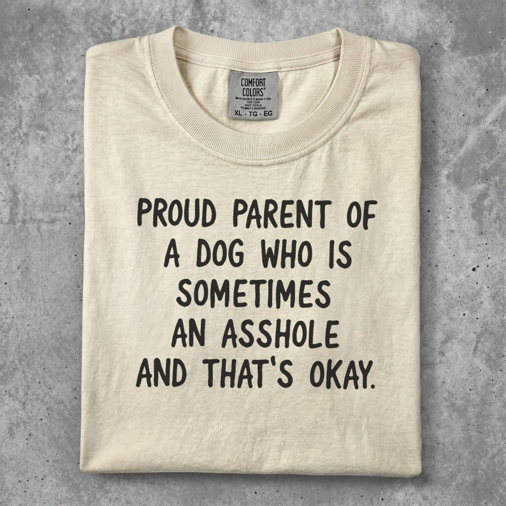 Cream t-shirt with "Proud parent of a dog who is sometimes an asshole and that's okay." text.