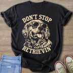 Black t-shirt with golden retriever wearing sunglasses and text "Don't Stop Retrieving".