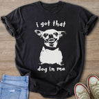 Black t-shirt with white text "i got that dog in me" and a snarling chihuahua graphic.