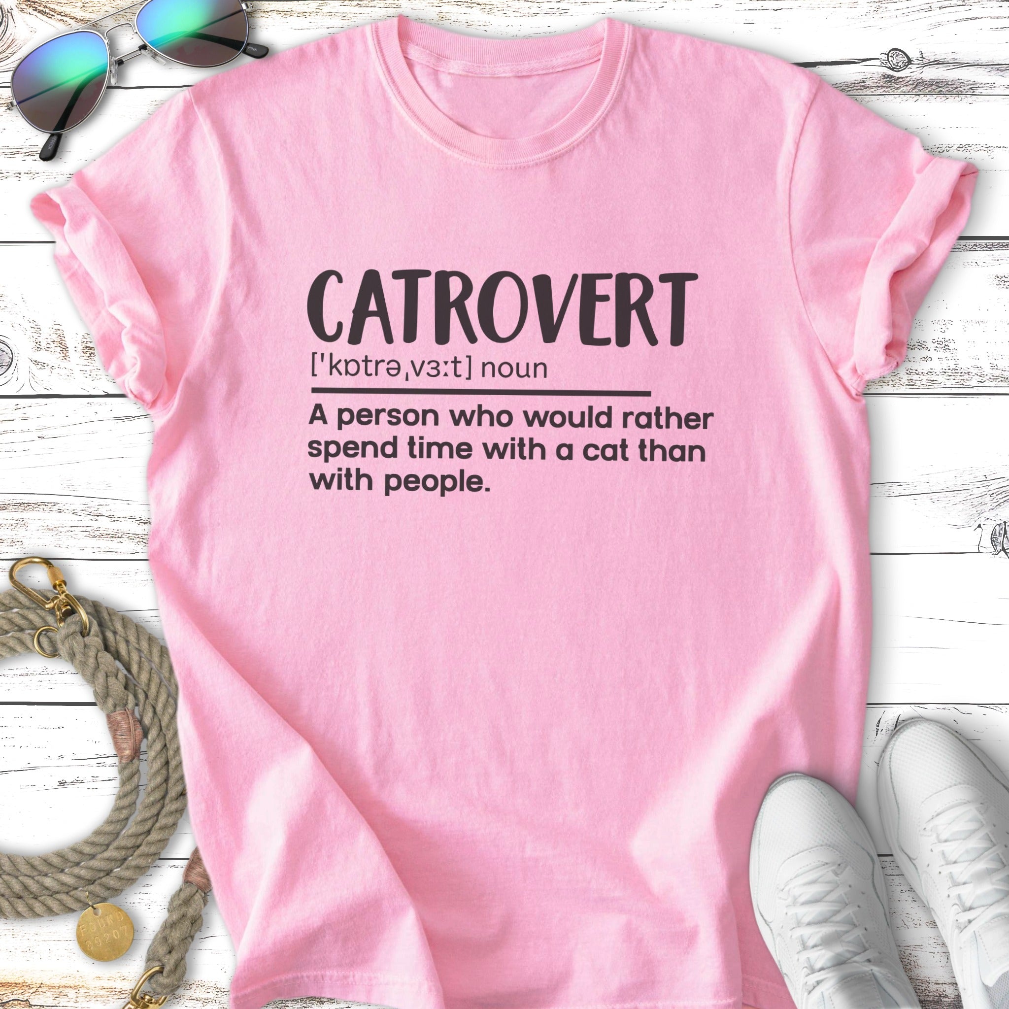 Pink t-shirt with "CATROVERT" and definition about preferring cats.