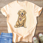 Peach t-shirt with a golden retriever wearing an "I Love Mom" tattoo.