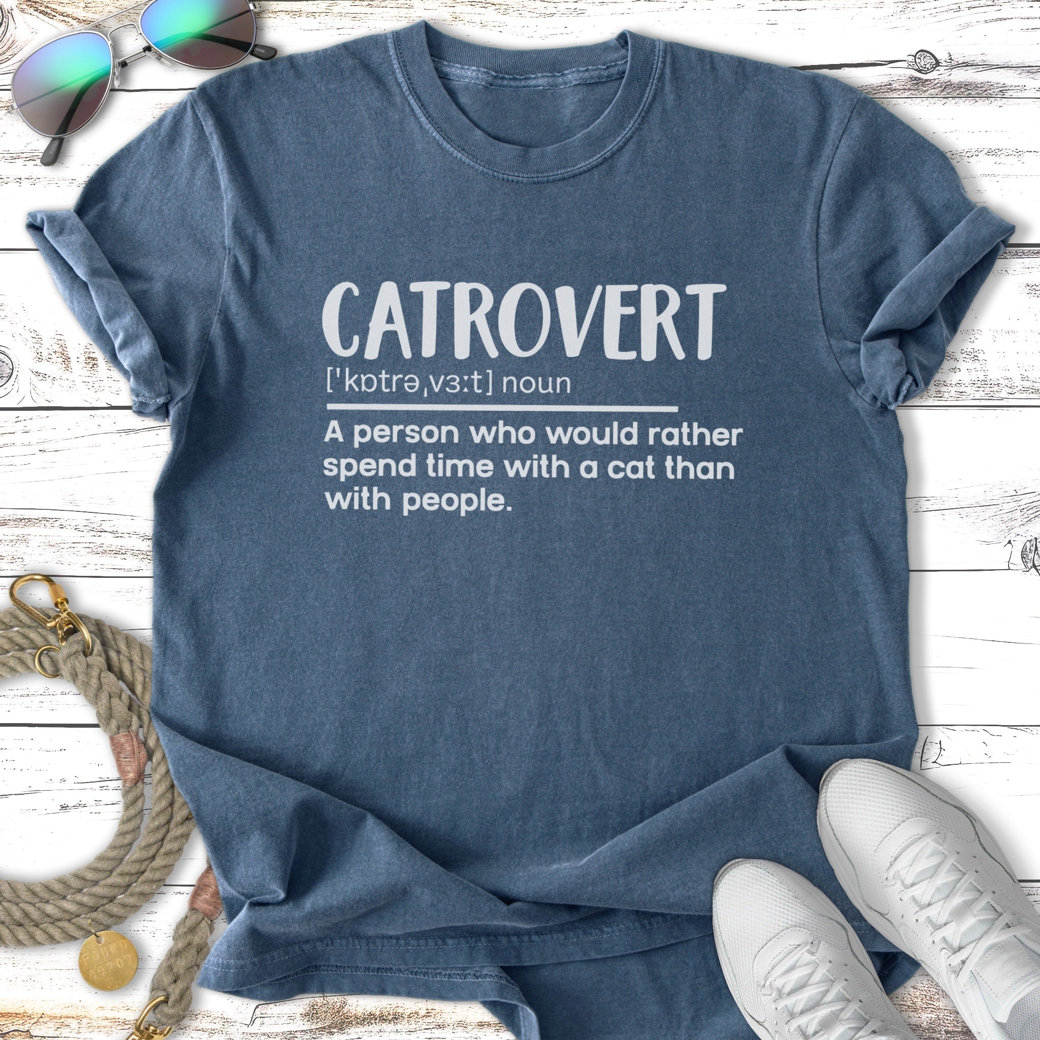 Blue t-shirt with "CATROVERT" definition, "A person who would rather spend time with a cat than with people."
