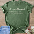 Green t-shirt with "shepherdtrovert" and its definition printed in white.