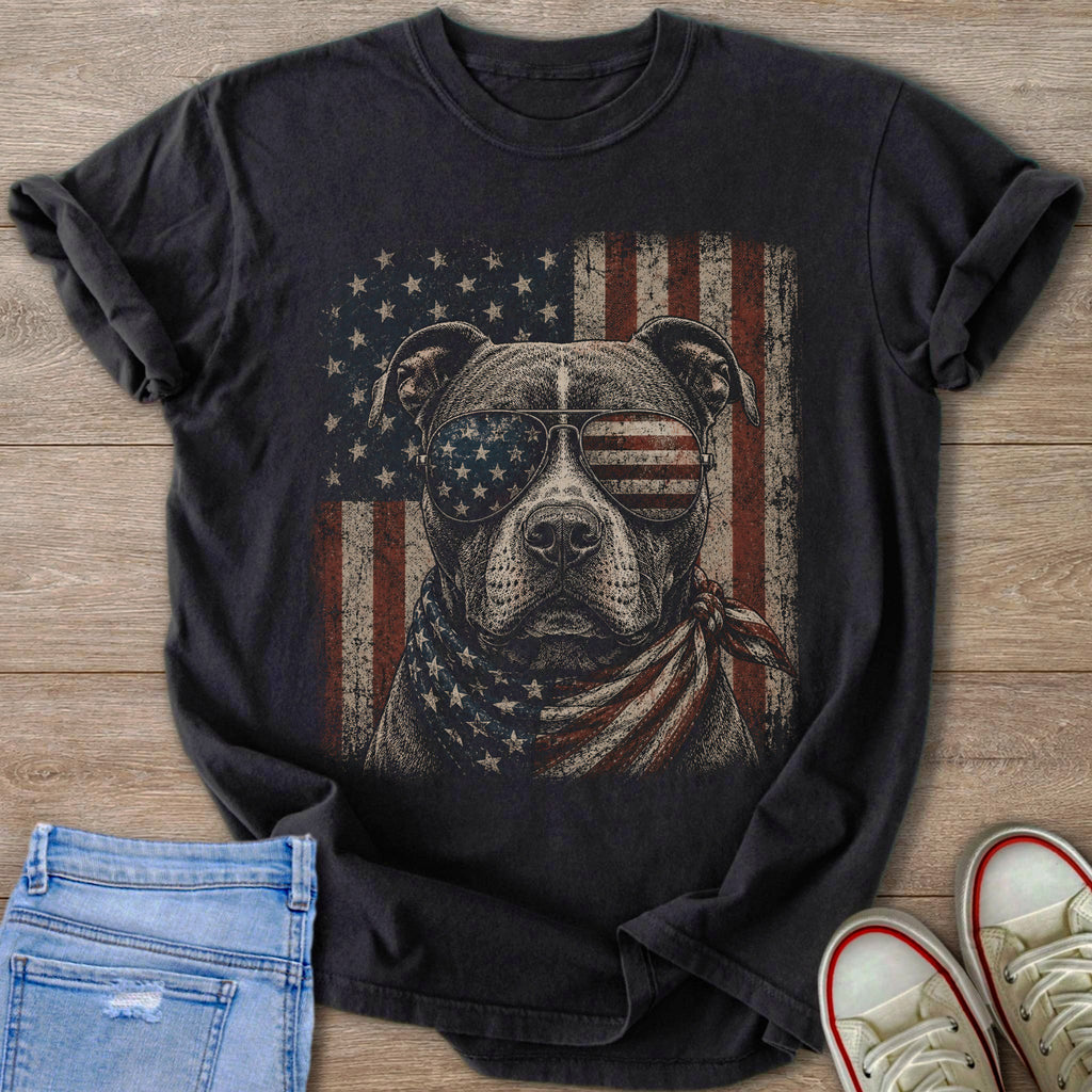 T-shirt with distressed graphic of dog wearing sunglasses and bandana with American flag.