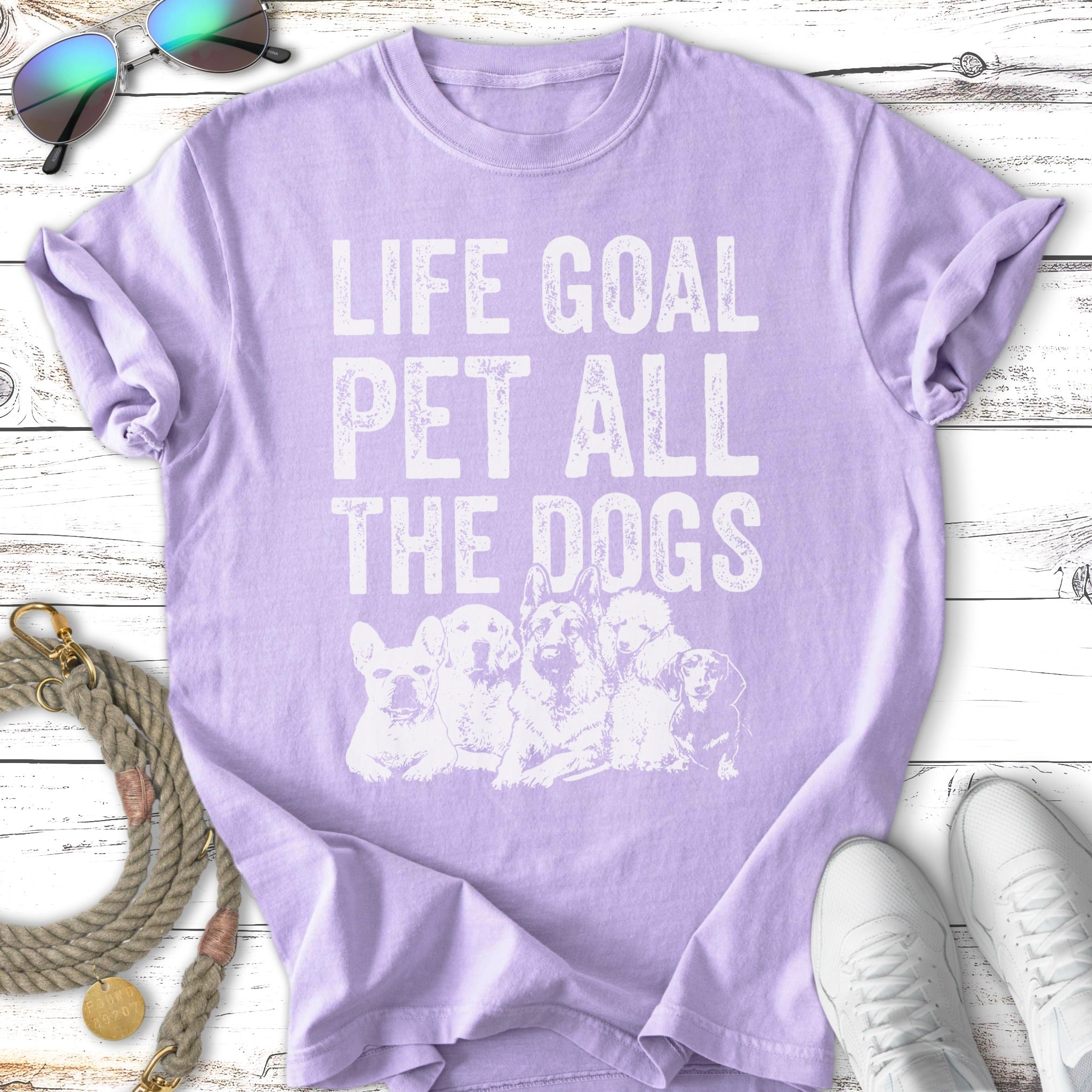 Light purple t-shirt with "LIFE GOAL PET ALL THE DOGS" and dog illustrations.