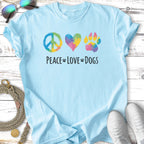 Light blue t-shirt with peace sign, heart, and paw print; "Peace Love Dogs" text.
