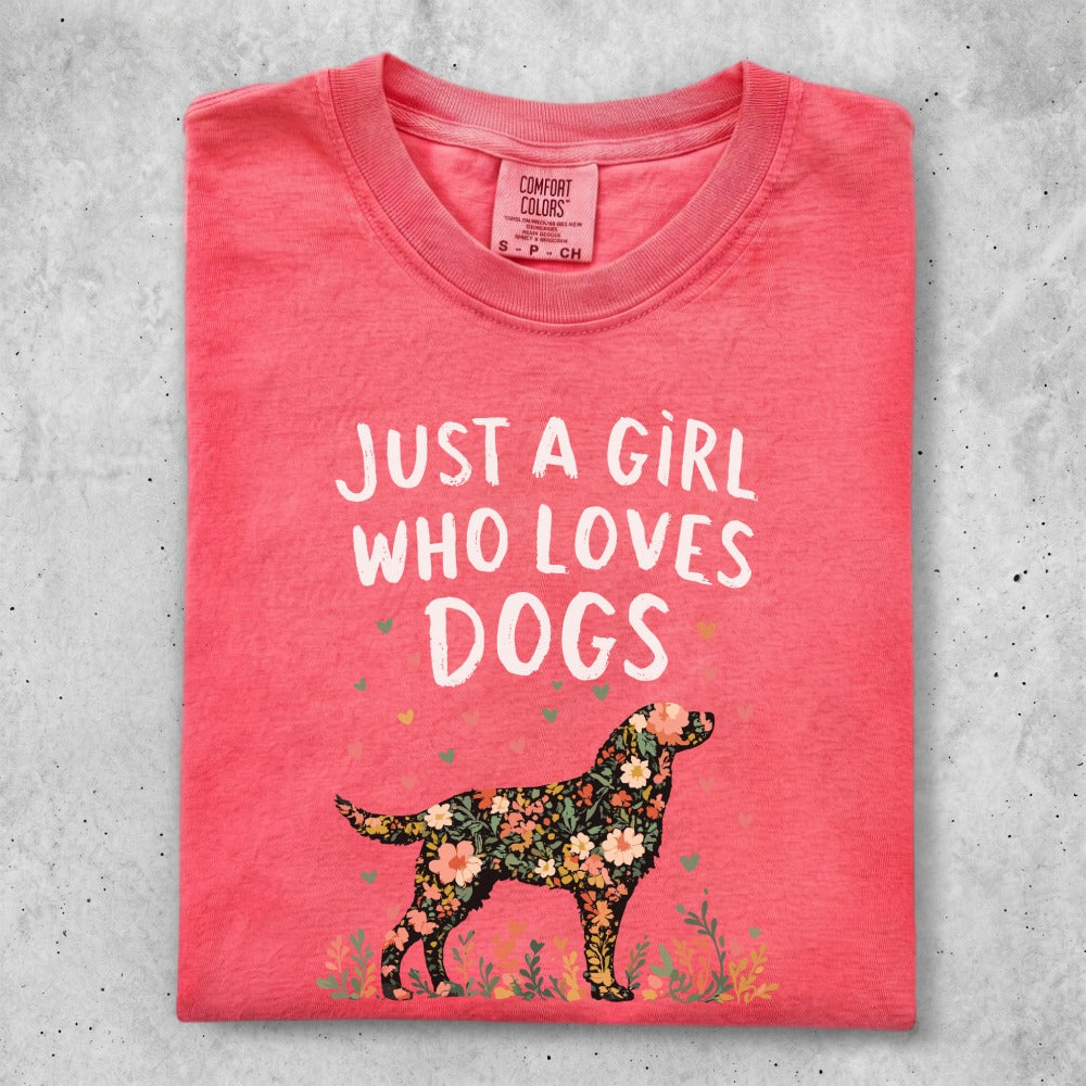Coral t-shirt with "Just a girl who loves dogs" and floral dog graphic.
