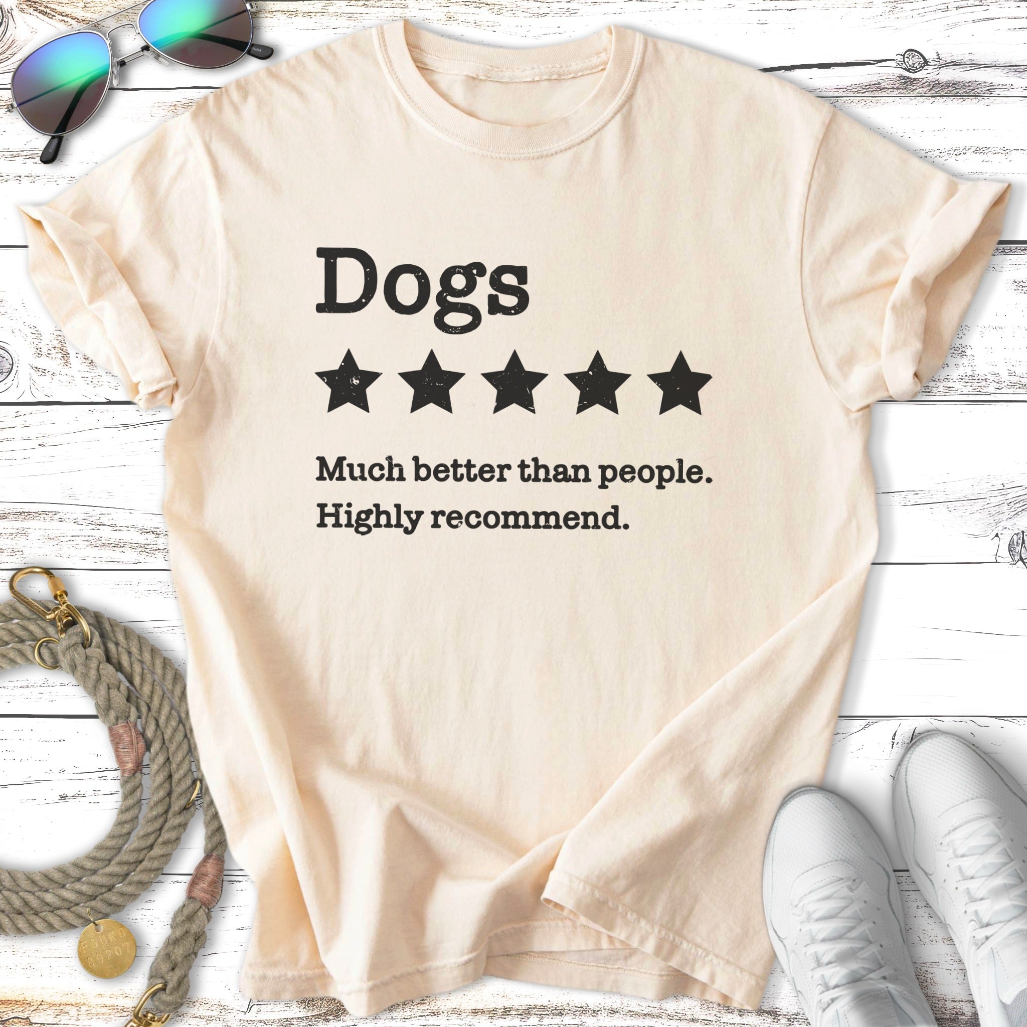 Cream t-shirt with "Dogs ★★★★★ Much better than people. Highly recommend."