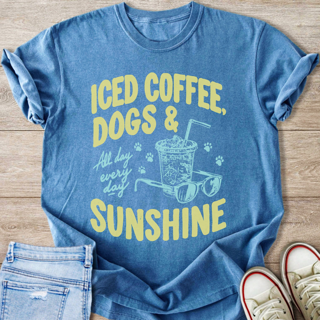 Blue t-shirt with yellow text reading "ICED COFFEE, DOGS & SUNSHINE".
