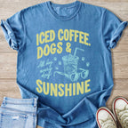 Blue t-shirt with yellow text reading "ICED COFFEE, DOGS & SUNSHINE".
