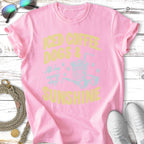 Pink t-shirt with "Iced Coffee Dogs & Sunshine" text and graphic.
