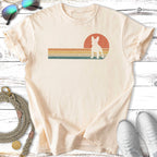 Cream t-shirt with retro French bulldog and sunset graphic.