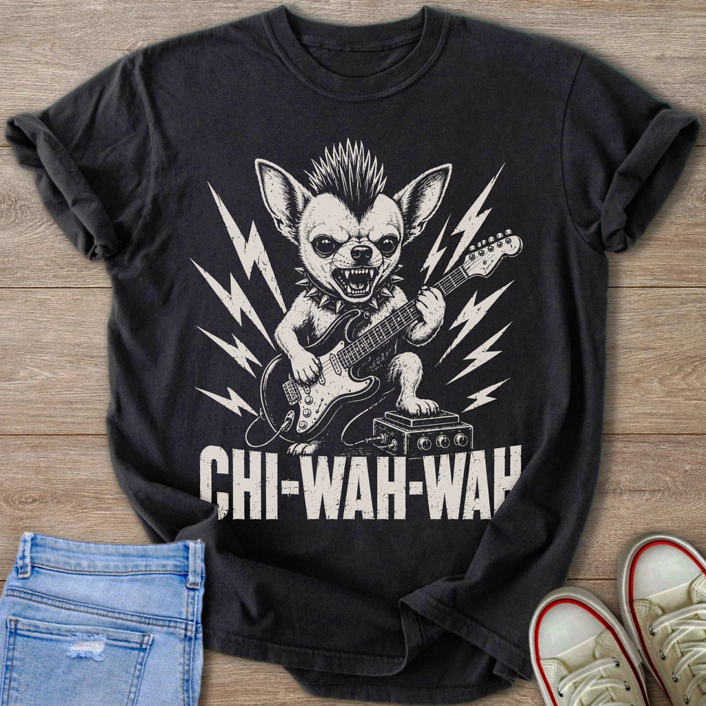 Chihuahua with mohawk playing electric guitar on dark t-shirt with "CHI-WAH-WAH" text.
