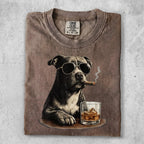 Pit bull dog wearing sunglasses, smoking a cigar, with whiskey.
